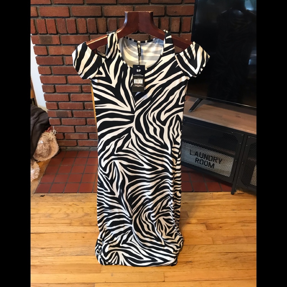 Brand new with tags BB open shoulder long dawn size S